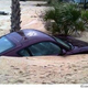 Illustration for article titled Hurricane Ida Buries Porsche Cayman In North Carolina Beach